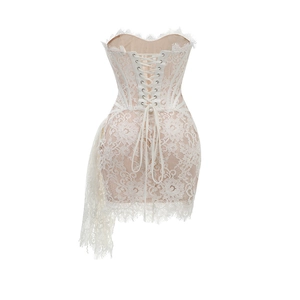 Detailed back view of white eyelash lace corset dress with adjustable ribbon lacing