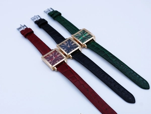 Three square quartz watches with Roman numerals in burgundy, black and forest green leather