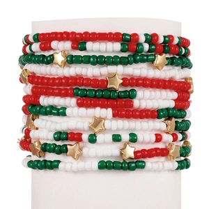 Multilayered seed bead bracelet set with red, green, white beads and golden stars
