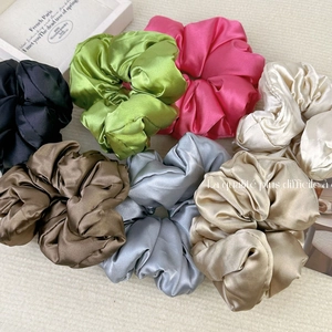 French style satin silk scrunchies set in various vintage colors on textured background