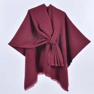 Elegant burgundy solid color knit poncho cape with tassel fringe and front tie knot closure