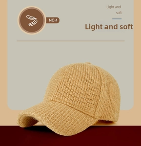 Detail of camel knit baseball cap showing the soft texture and thick yarn weaving pattern