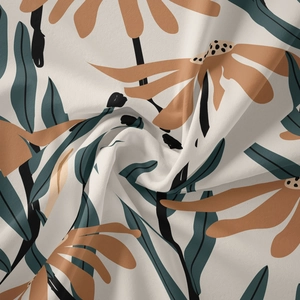 Close-up of soft bohemian fabric texture featuring yellow floral patterns and vintage leaves