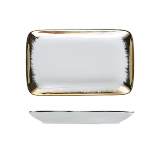 White ceramic steak plate with gold rim and sunburst brushstroke edge detail