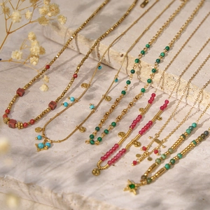 Handmade stainless steel bohemian beaded necklace with crystal charms and vintage gold accents