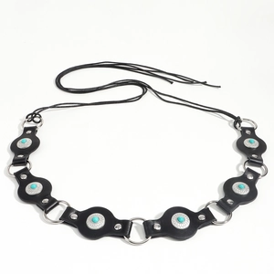 Western style belt with turquoise stone inlays on black leather oval patches