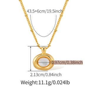 Macro detail of gold necklace with shell pendant showing precise size and weight parameters