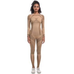 Detailed close-up of seamless compression suit with breathable mesh and ribbed texture