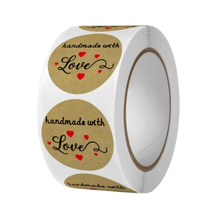 Roll of brown kraft paper stickers featuring handmade with love text and red hearts
