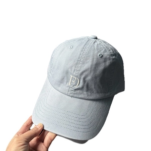 Light blue washed cotton baseball cap with white FD embroidery and curved brim