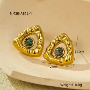 Detail of triangle gold-plated stainless steel earrings with green natural stone inlay