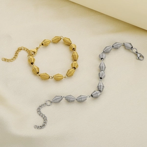 Bracciali minimalisti in acciaio al titanio placcati oro 18K e argento con trama a spirale