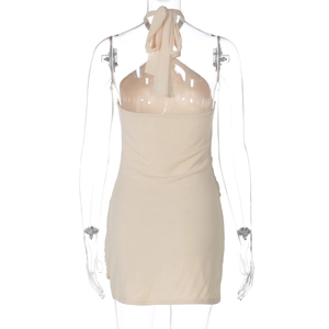 Detailed back view of a beige halter neck mini dress with backless design and slim fit cut