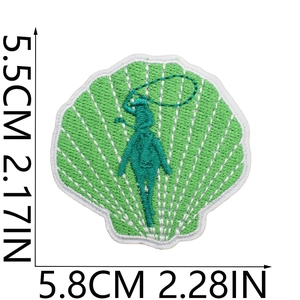 Macro detail of green shell embroidered patch with 5.5cm x 5.8cm size measurements
