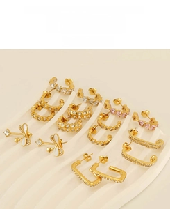 Collection de boucles d'oreilles en acier plaqué or 18k avec zircon et nœuds