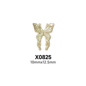 Detail of a golden butterfly nail art alloy charm, model X0825, size 10mmx12.5mm