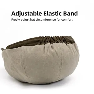 Retro newsboy cap with back elastic adjustment detail in beige and brown canvas