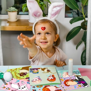 Kid using Frozen cartoon puzzle stickers for creative DIY face-changing activities