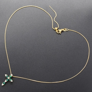 Gold plated cross necklace with emerald teardrop stones and white zircon crystals