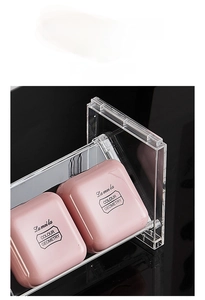 Macro shot of thick transparent acrylic storage organizer for makeup powder and pallets