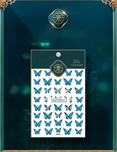 Detailed sheet of 5D blue gradient butterfly nail art stickers with frosted texture