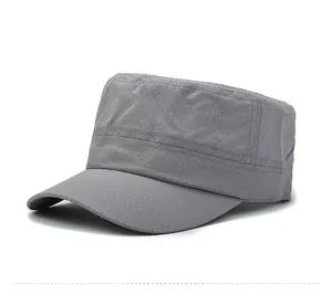 Detail of dark grey flat top military cap featuring breathable laser-cut mesh fabric