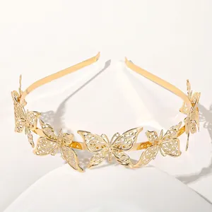 Close-up of golden hollow butterfly headband showing dimensions 2.5cm and 14g weight