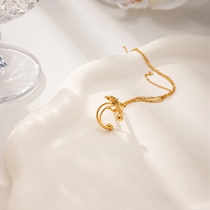 Minimalist gold plated cross double ring ear cuffs with delicate chains and star detail