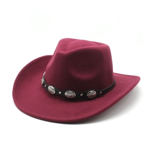 Close-up of wine red wool felt cowboy hat with black leather band and silver metal studs
