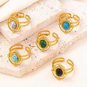 Detailed set of adjustable gold rings with bohemian colorful stone sunburst settings