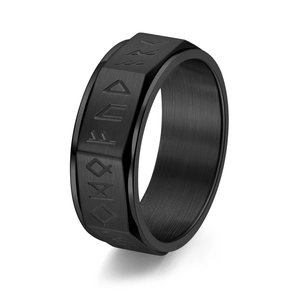 Detail of black matte stainless steel Viking ring featuring engraved Nordic runes