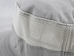 Detail of breathable mesh panels and high-quality stitching on quick-dry sun hat
