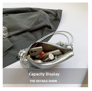 Silver liquid metal texture bag showing spacious interior for phone and makeup