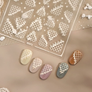 Self-adhesive 3D embossed white lace and mesh nail stickers on various colored tips