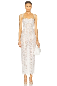 Detail of white lace midi dress featuring slim fit silhouette and delicate spaghetti straps