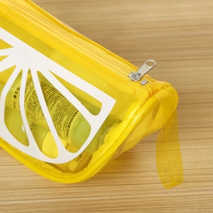 Transparent yellow PVC cosmetic bag with lemon print and convenient zipper handle