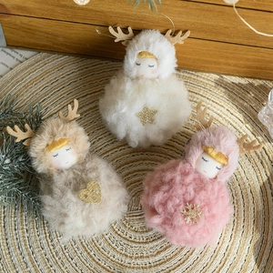 Three plush reindeer angel ornaments in white, beige, and pink for Christmas decoration