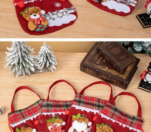 Detail of 3D Santa and Snowman embroidery on red fabric Christmas gift bags with handles