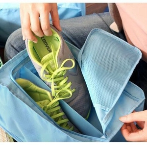 Sky blue waterproof travel shoe bag with breathable mesh and interior dividers for sneakers