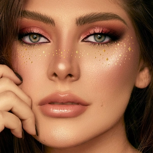 Metallic gold freckle tattoo stickers with star patterns for party makeup looks