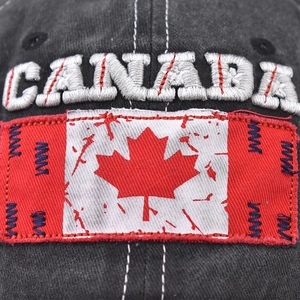 Faded cotton baseball cap with 3D Canada embroidery and vintage maple leaf patch
