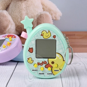 Mint green egg-shaped virtual pet game with yellow duck design and metal keychain