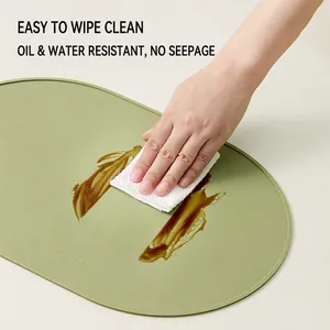 Wasserdichte salbeigrüne ovale Silikon-Tischmatte mit hitzebeständiger BPA-freier Oberfläche