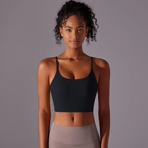 Detail of a black sports bra with thin straps and a U-shaped neckline for yoga workout