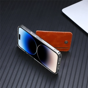 Detail view of brown leather wallet stand with metal snap on a clear phone case