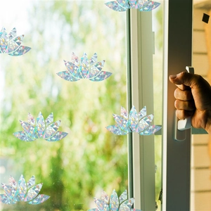 Rainbow prism lotus window film creating holographic static cling effects on glass