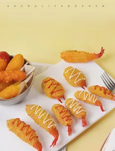 Detailed view of realistic tempura shrimp and crab claw models on a ceramic plate