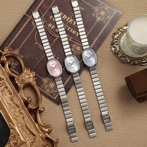 Elegant women's oval quartz watches with bamboo steel bands and colorful sunray dials