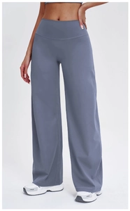 Detail shot of high-waist wide leg yoga pants in dark grey with slimming fit design