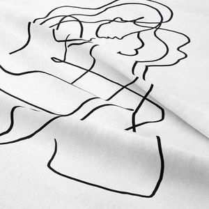 Detail of minimalist black line art portrait printed on white cotton linen fabric texture